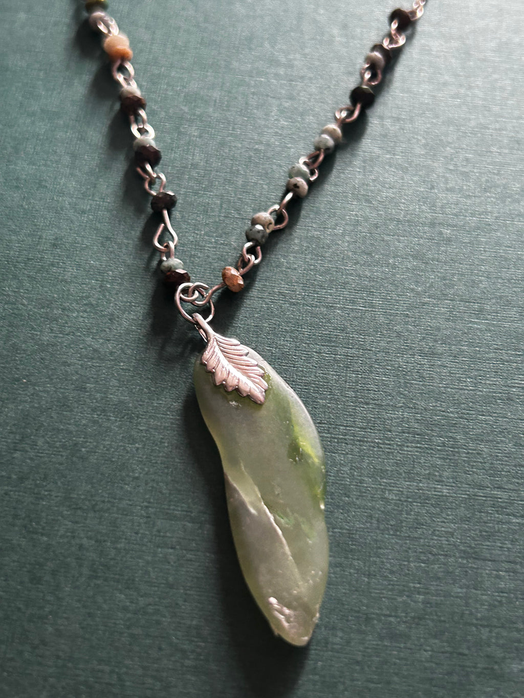 Jade pendant with crafted bead chain