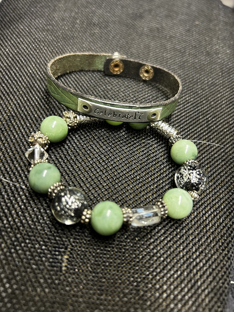 M.C’s two-piece bracelet set featuring a sage green leather cuff with Celebrate plate and mint stone beaded bracelet.